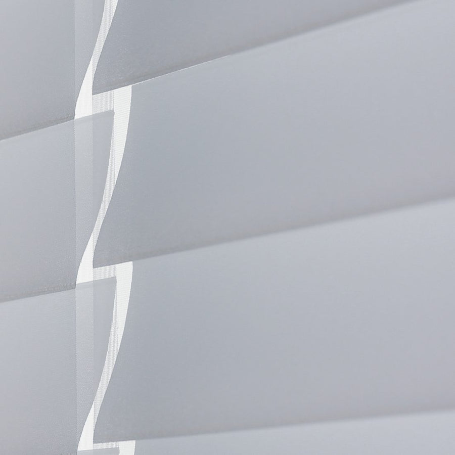 Close up of the fabric vanes, showing the soft edge where each one meets the sheer backing
